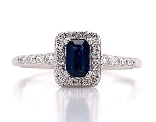 9ct White Gold 0.55ct Sapphire And 0.10ct Diamond Halo Ring