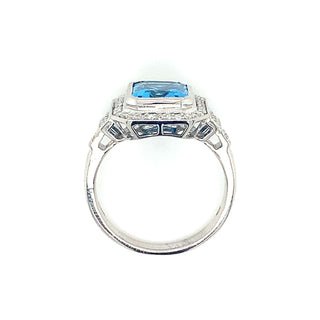 9ct White Gold 4.18ct Emerald Cut Blue Topaz and Diamond Pave Set Halo