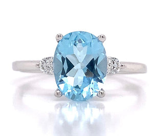 9ct White Gold 2.50ct Oval Sky Blue Topaz And 0.08ct Diamond Ring