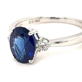 1.86ct Oval Sapphire with .16ct Round Brilliant Diamond Side Stones