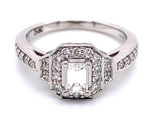 18ct White Gold 0.45ct Emerald Cut Halo Diamond Ring With Pave Set Diamond Shoulders