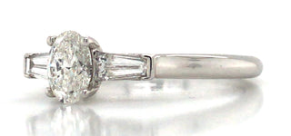 Platinum GIA Oval Diamond Ring with Baguette Side Stones