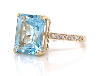 9ct Yellow Gold 4ct Sky Blue Topaz And 0.10ct Diamond Ring