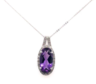 9ct White Gold Oval Amethyst With a Halo of Diamonds