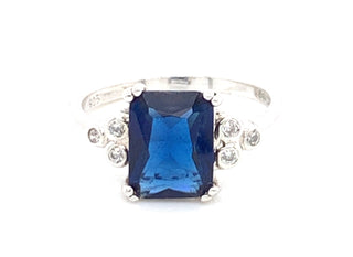 Sterling Silver Sapphire And Cz Emerald Cut Ring With A trio of Side Stones