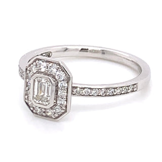 18ct White Gold Rub Over Emerald Cut Diamond Halo Ring