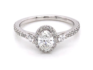 18ct White Gold Oval Halo with Side Stones & Diamond Shoulders Diamond Engagement Ring